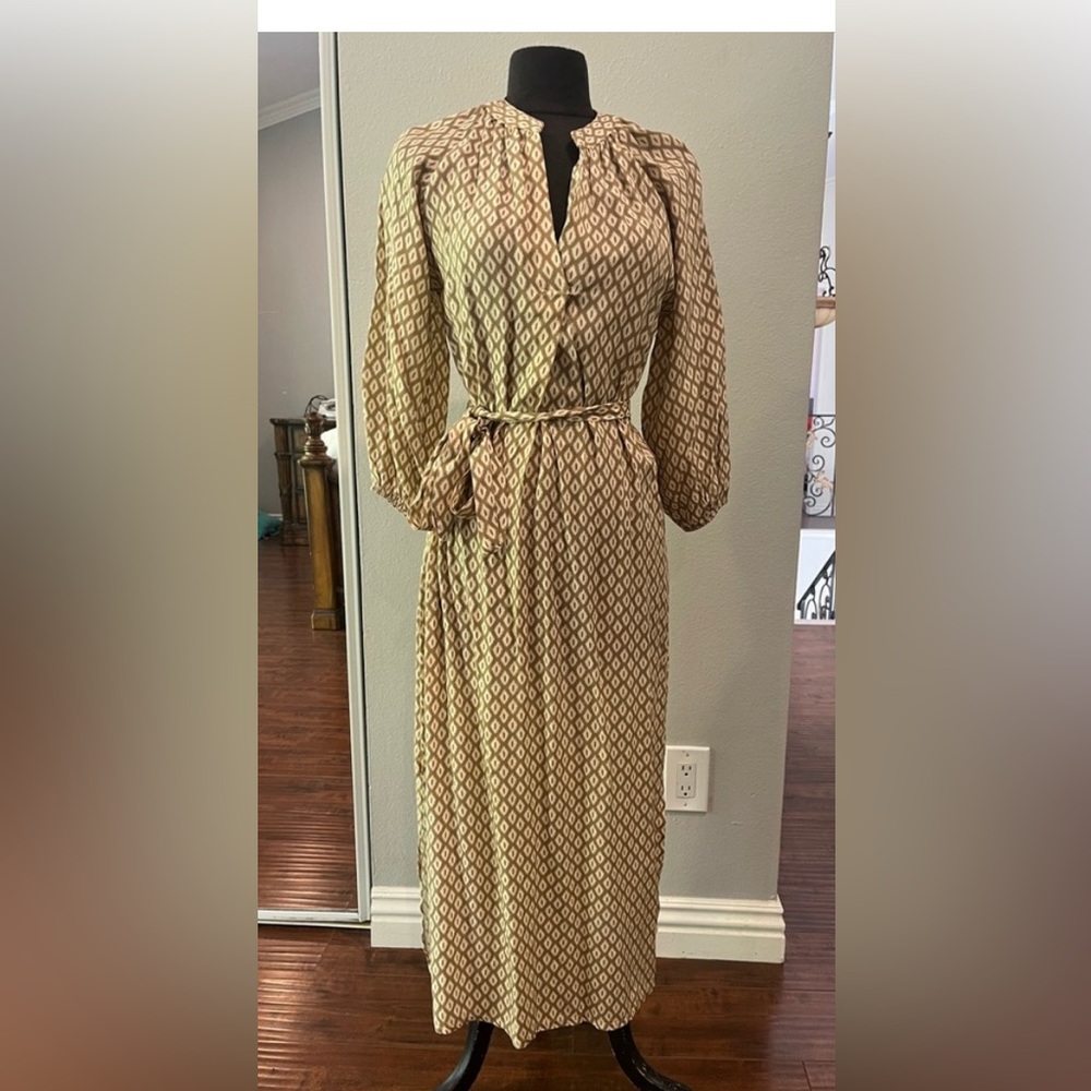 Brand new with tag attached midi dress made in Italy .